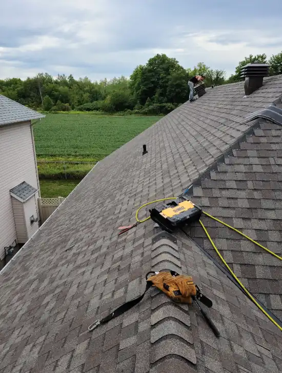 Done Right Roofing - completed installation in Ottawa of patterned tile ashphalt shingles by Certainteed.
